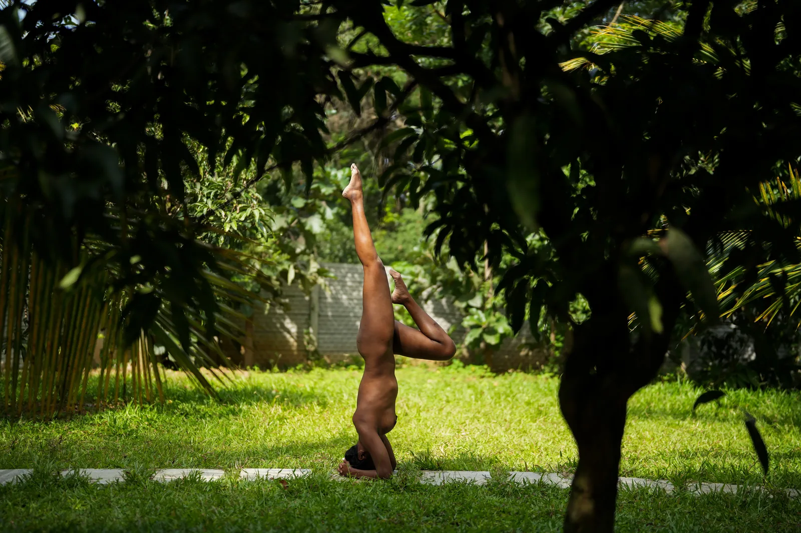 Fine art headstand, crossed legs