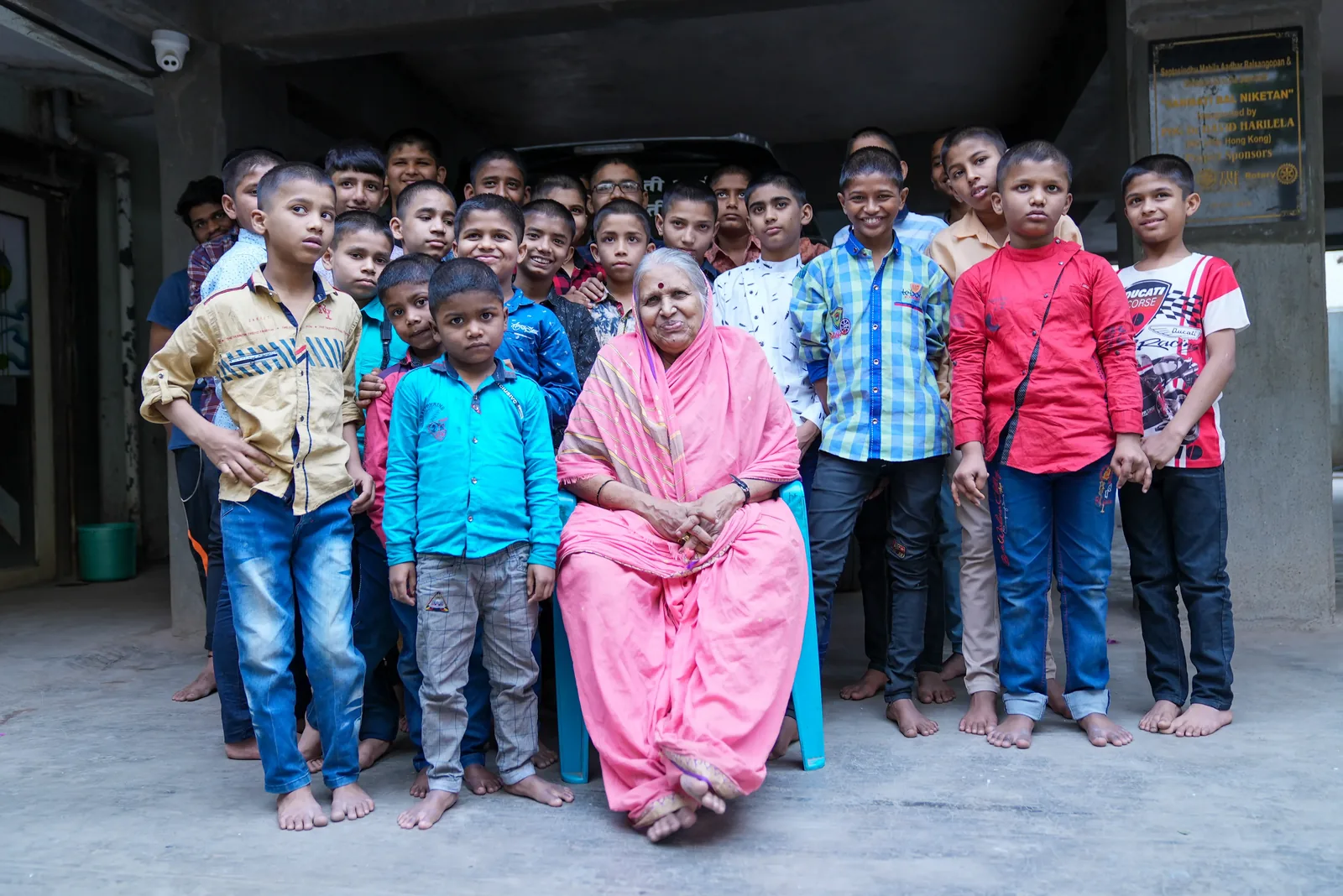 Grandmother with a group of boys